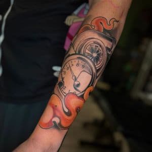 Black & Grey + Color cars tattoo on Forearm by Radtattoo on TattMe