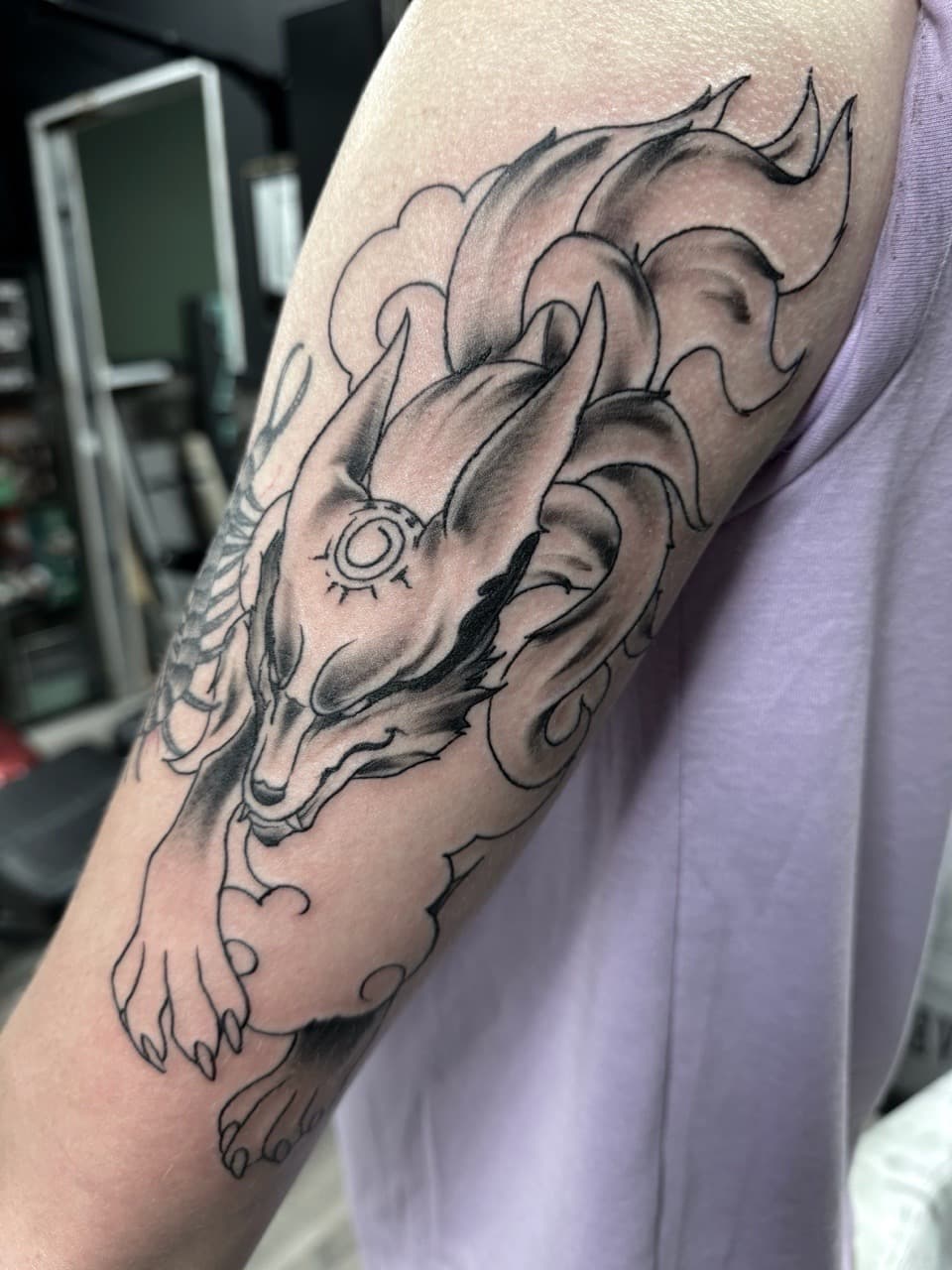 Black & Grey + Illustrative kitsune tattoo on Upper Arm by Radtattoo on TattMe