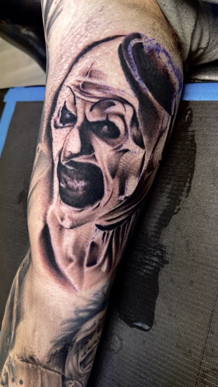 Black & Grey + Realism clown tattoo on Upper Arm by Radtattoo on TattMe