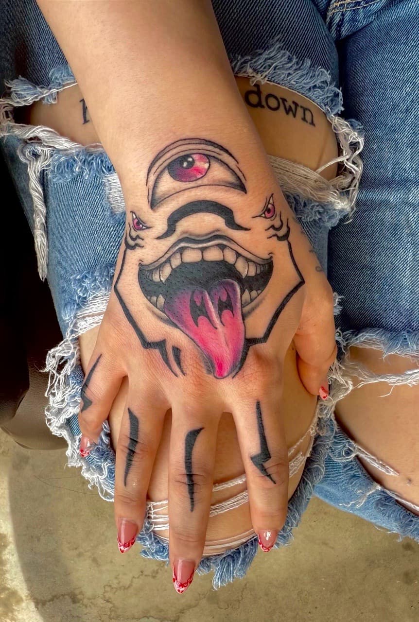New School + Illustrative monster tattoo on Hand by Radtattoo on TattMe