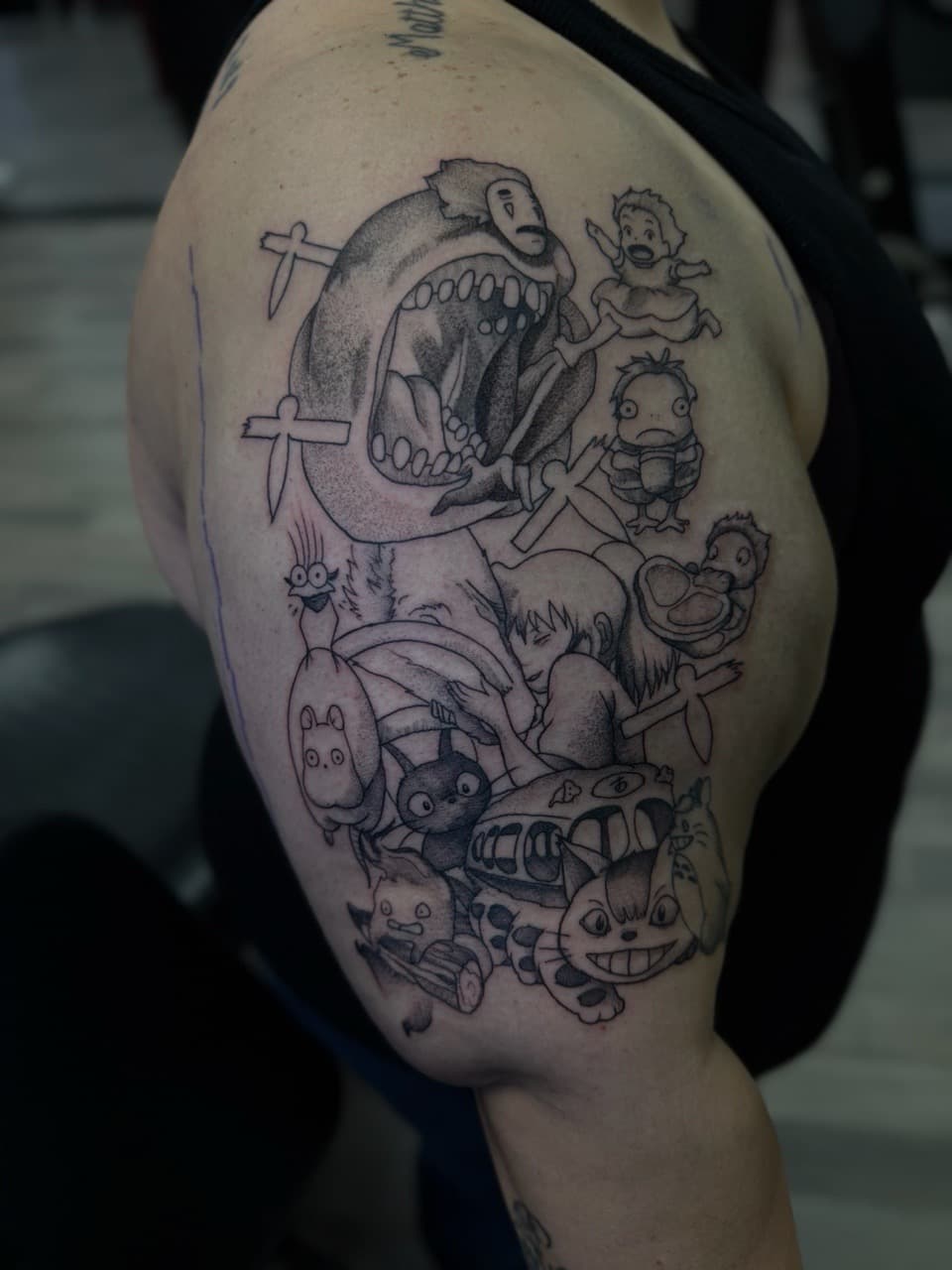 Anime + Black & Grey ghibli characters tattoo on Upper Arm by Radtattoo on TattMe