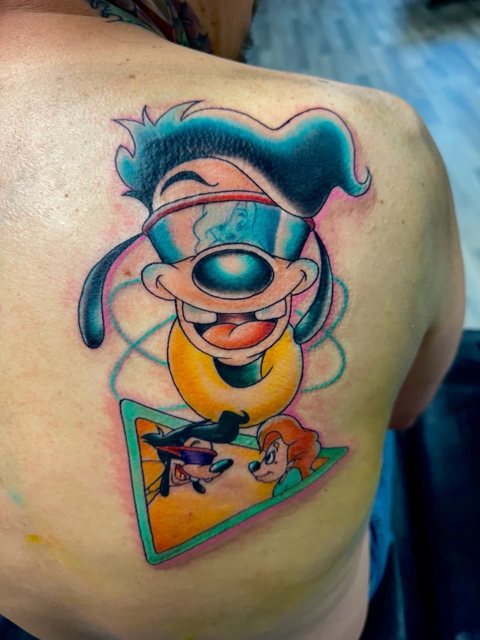 Cartoon + Pop Culture max goofy tattoo on Upper Back by Radtattoo on TattMe