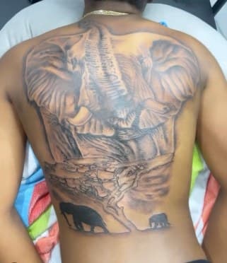 Realism + Black & Grey elephant tattoo on Upper Back by Lo_Mann on TattMe