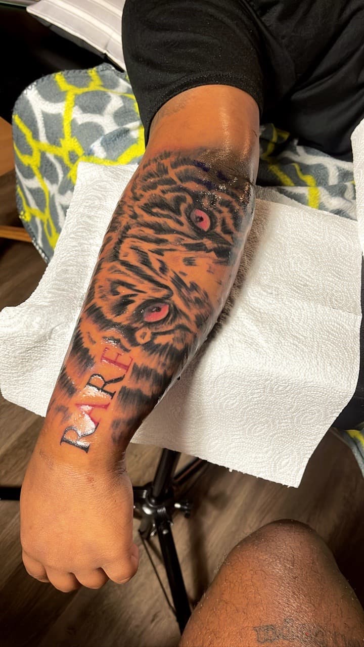 Realism + Black & Grey tiger tattoo on Forearm by NUDEINK on TattMe