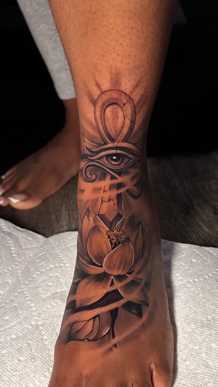 Black & Grey + Illustrative ankh tattoo on Ankle by Christopher_Ink on TattMe
