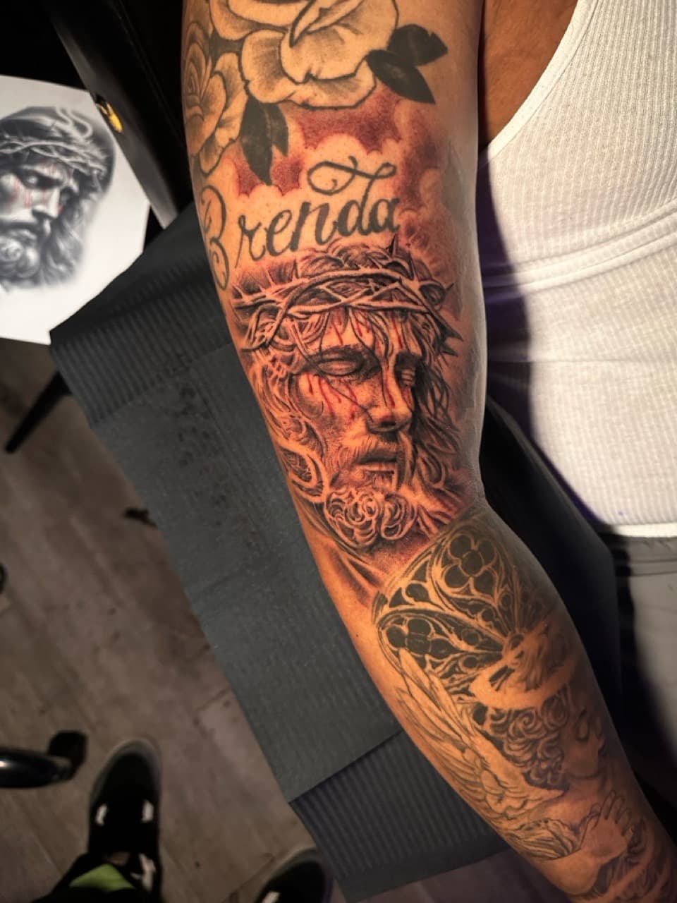 Black & Grey + Realism jesus tattoo on Full Sleeve by Christopher_Ink on TattMe