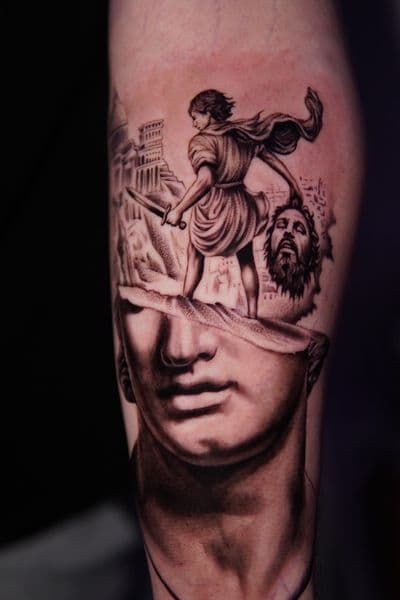 Black & Grey + Illustrative statue tattoo on Upper Arm by Moe_Tatts on TattMe