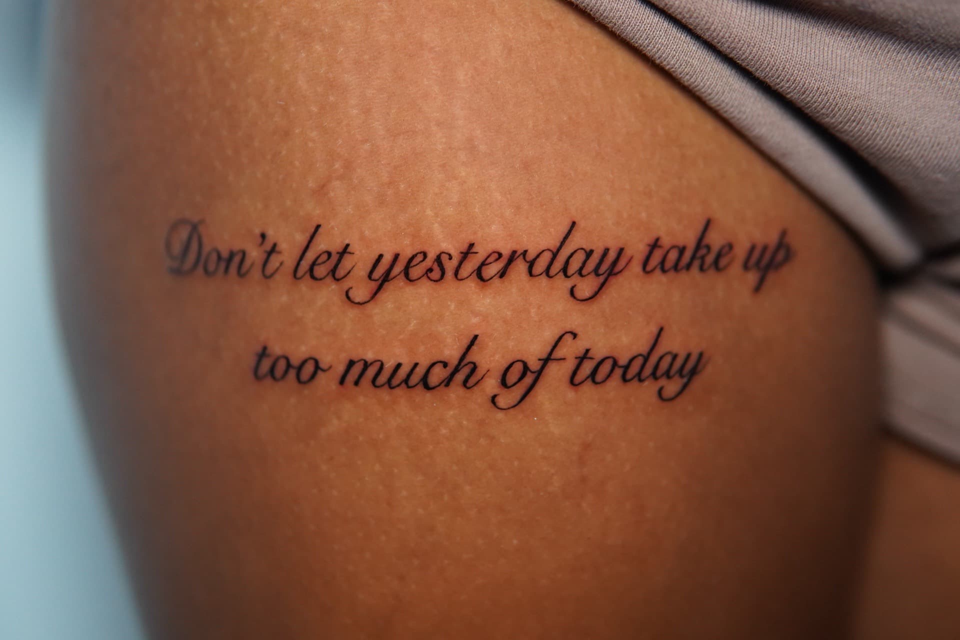 Lettering + Script quote tattoo on Upper Arm by Moe_Tatts on TattMe