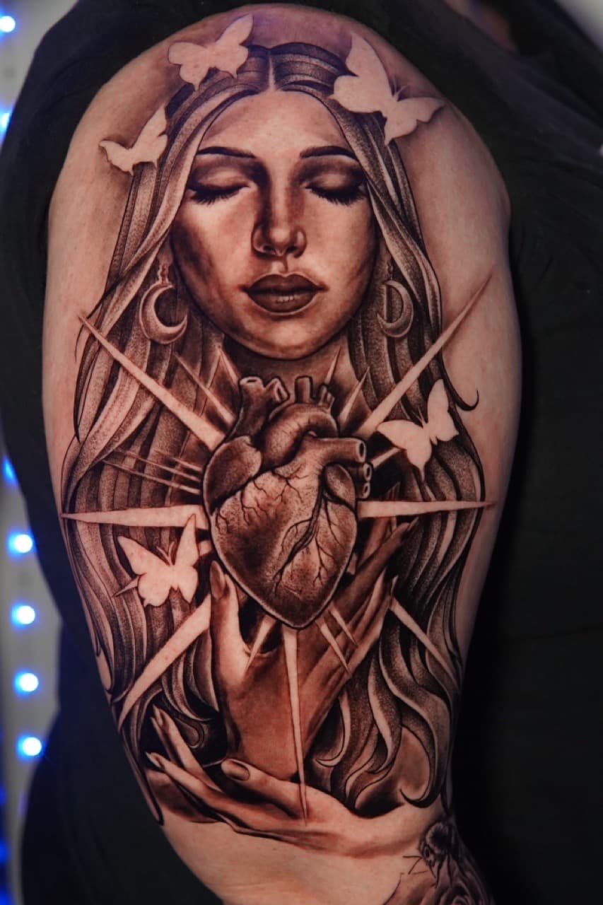 Black & Grey + Illustrative woman tattoo on Upper Arm by Moe_Tatts on TattMe