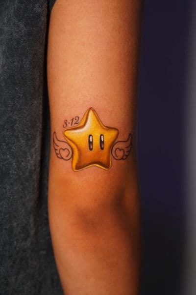 Color + Pop Culture star tattoo on Upper Arm by Moe_Tatts on TattMe