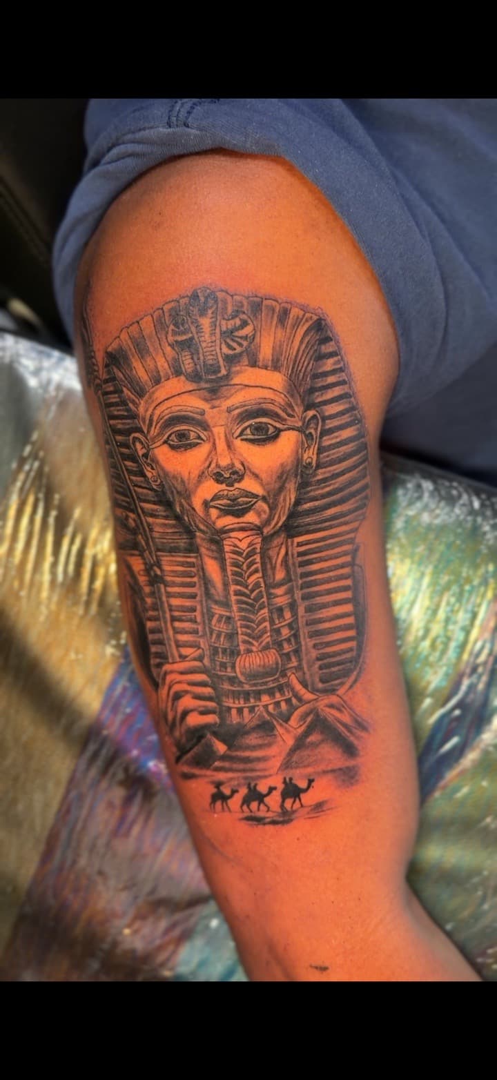 Black & Grey + Realism pharaoh tattoo on Upper Arm by King_Chaka_Roots on TattMe