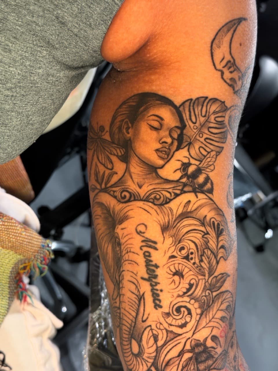 Fine Line + Black & Grey woman tattoo on Upper Arm by King_Chaka_Roots on TattMe