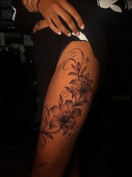 Fine Line + Black & Grey lilies tattoo on Thigh by Anita_Tattoo on TattMe