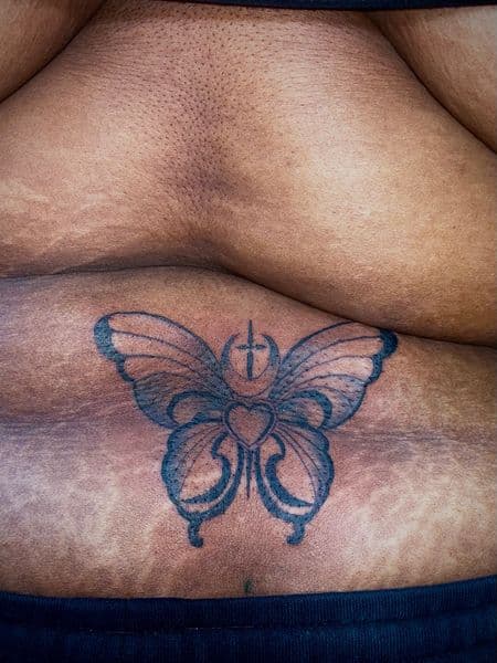 Black-work + Line-work butterfly tattoo on Lower Back by Anita_Tattoo on TattMe