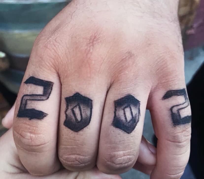 Lettering + Black-work numbers tattoo on Fingers by Dough_Girls_Inks on TattMe