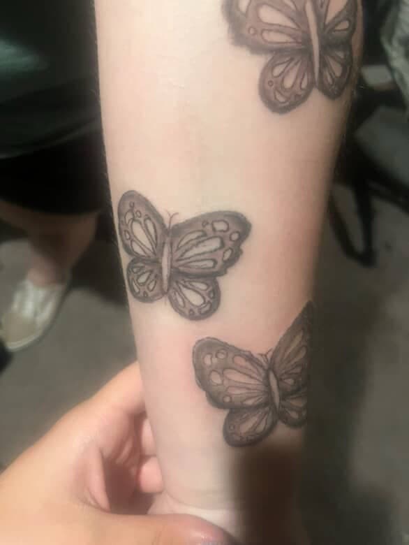 Black & Grey + Illustrative butterflies tattoo on Forearm by Dough_Girls_Inks on TattMe