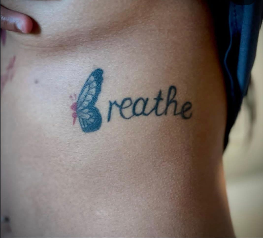 Lettering + Script butterfly tattoo on Ribs by Cay_Tattoos on TattMe