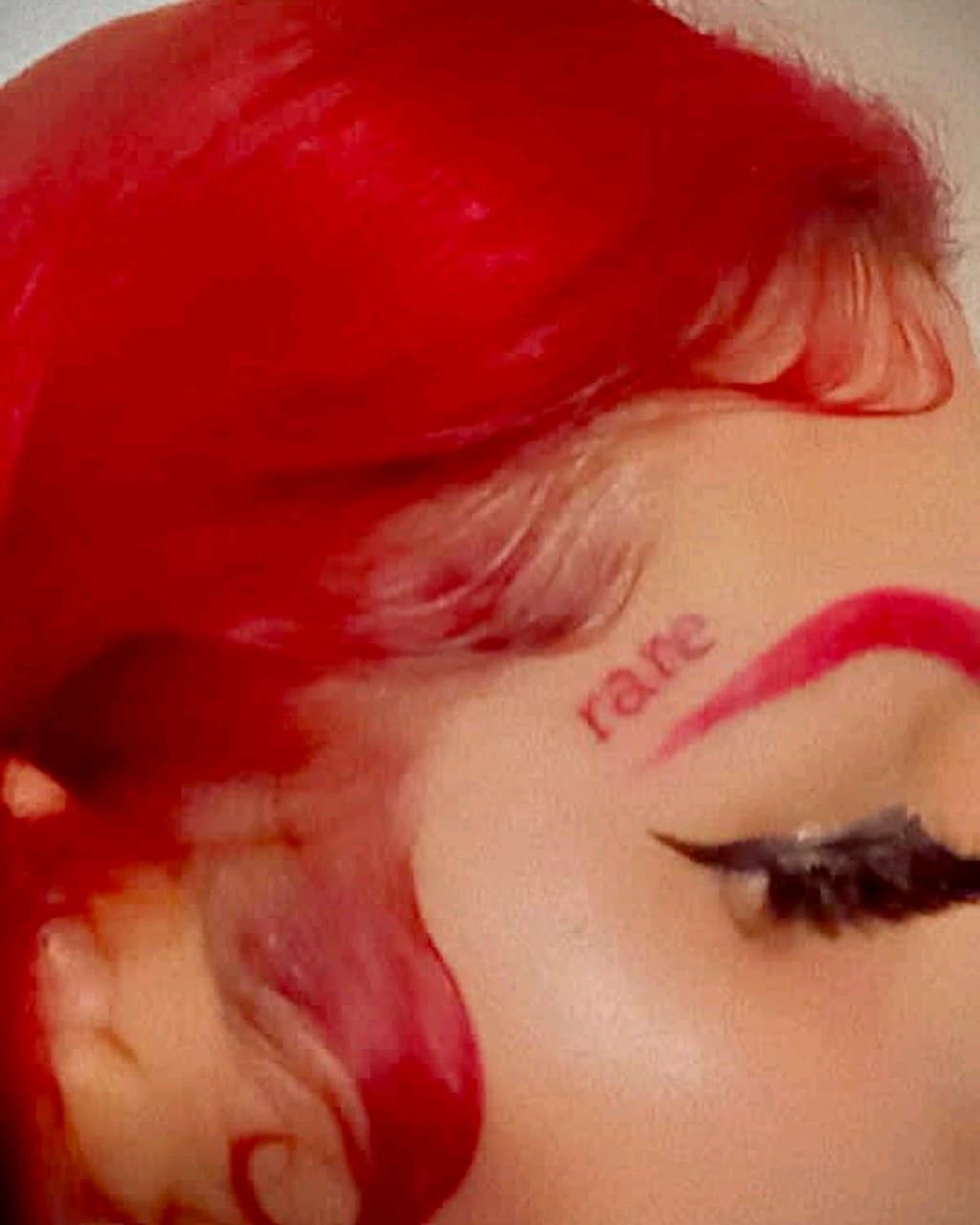 Lettering + Minimalist rare tattoo on Face by Cay_Tattoos on TattMe