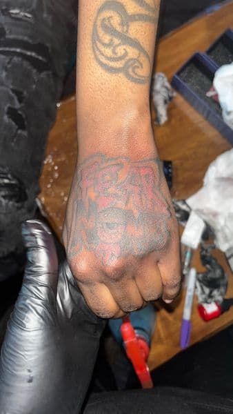 Lettering + Tribal lettering tattoo on Hand by TeezTalent on TattMe