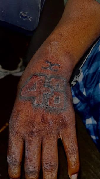 Lettering + Color numbers tattoo on Hand by TeezTalent on TattMe