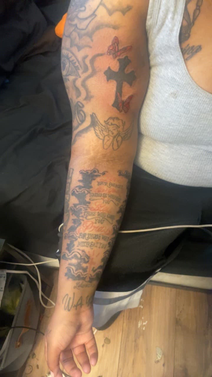 Black & Grey + Lettering cross tattoo on Full Sleeve by TattedbyTeeno on TattMe