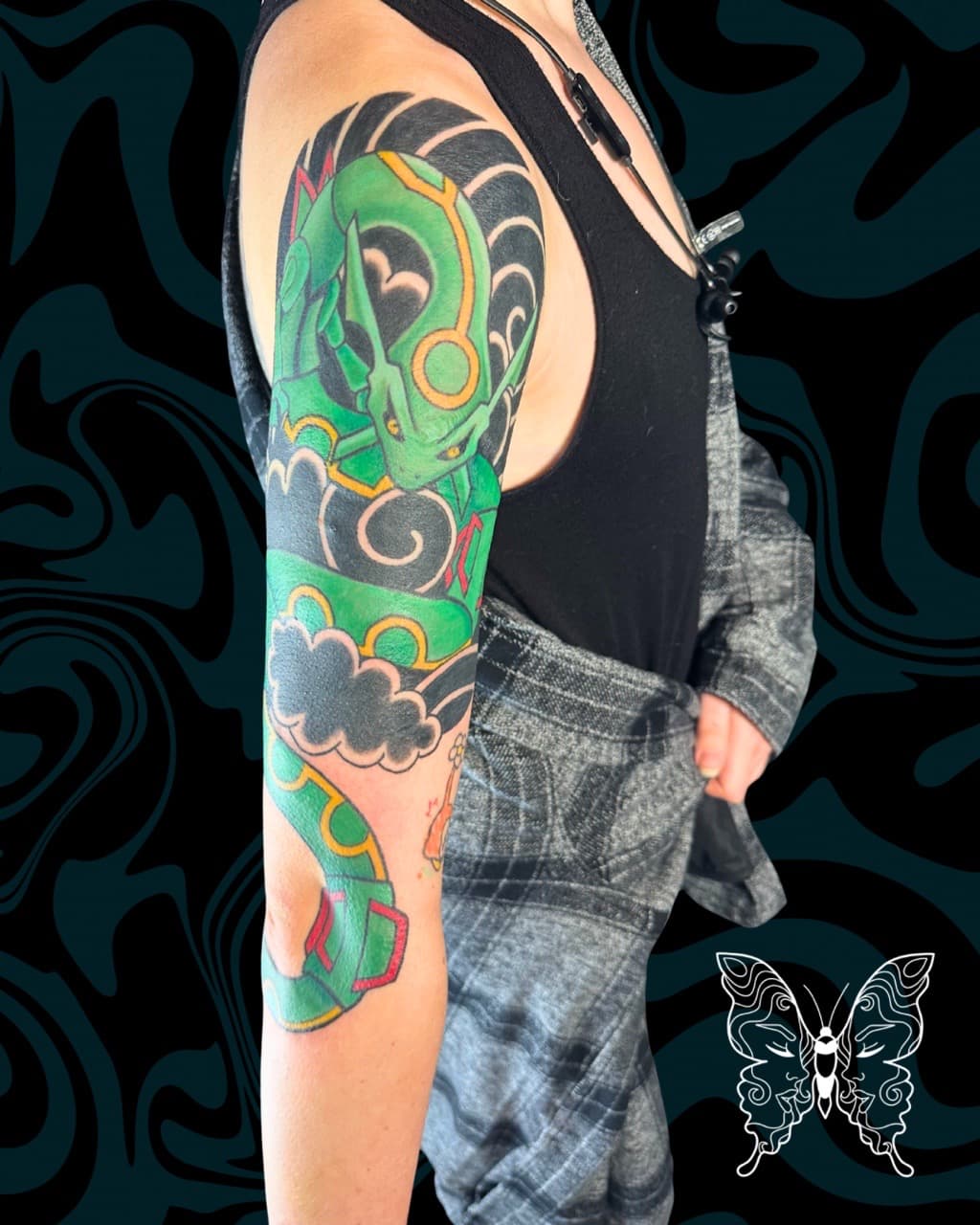 Anime + Pop Culture rayquaza tattoo on Upper Arm by Tattoos_by_Nicci on TattMe