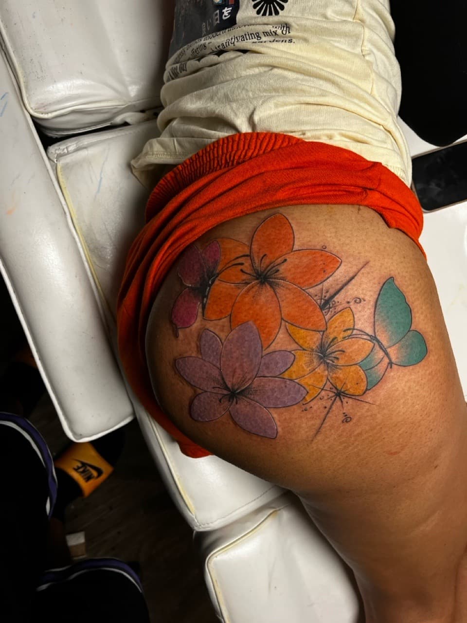 Color + Illustrative flowers tattoo on Thigh by Moeinkk on TattMe