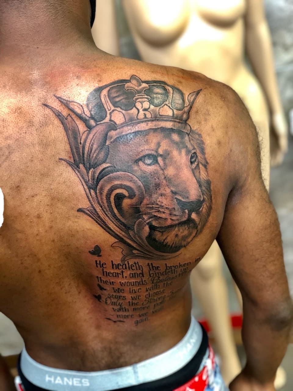 Black & Grey + Illustrative lion tattoo on Upper Back by Moeinkk on TattMe