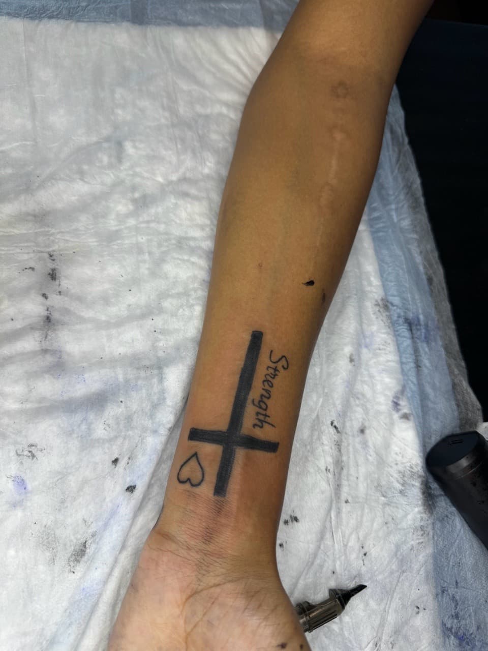 Lettering + Script strength tattoo on Forearm by InkByArtie on TattMe