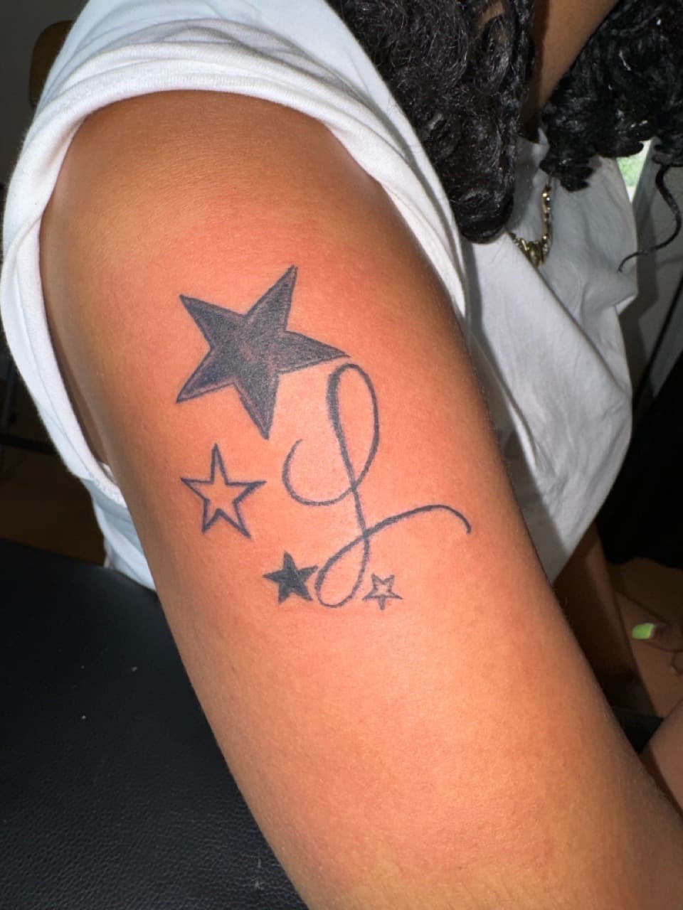 Line-work + Fine Line stars tattoo on Upper Arm by InkByArtie on TattMe