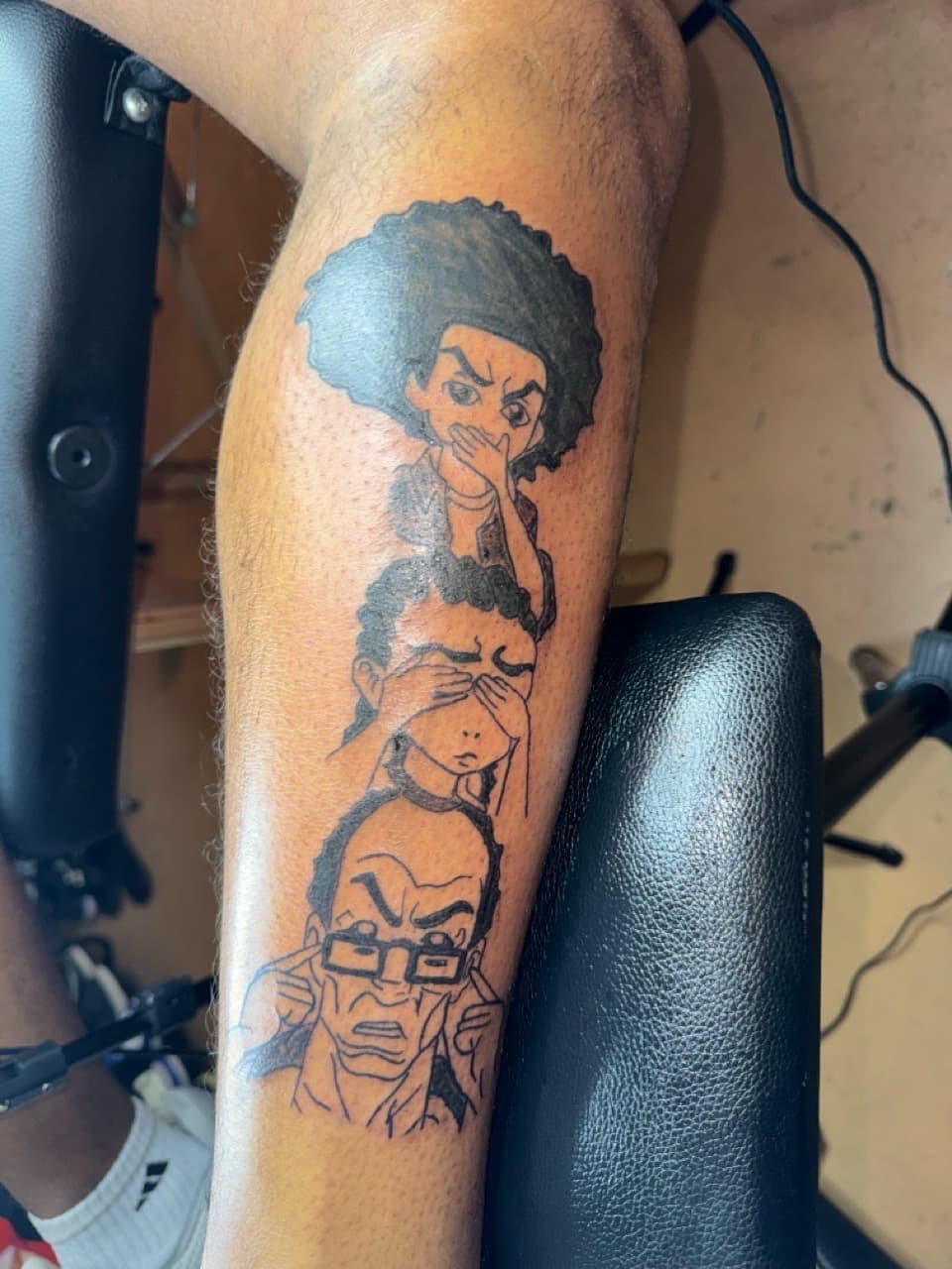 Cartoon + Pop Culture boondocks tattoo on Calf by InkByArtie on TattMe