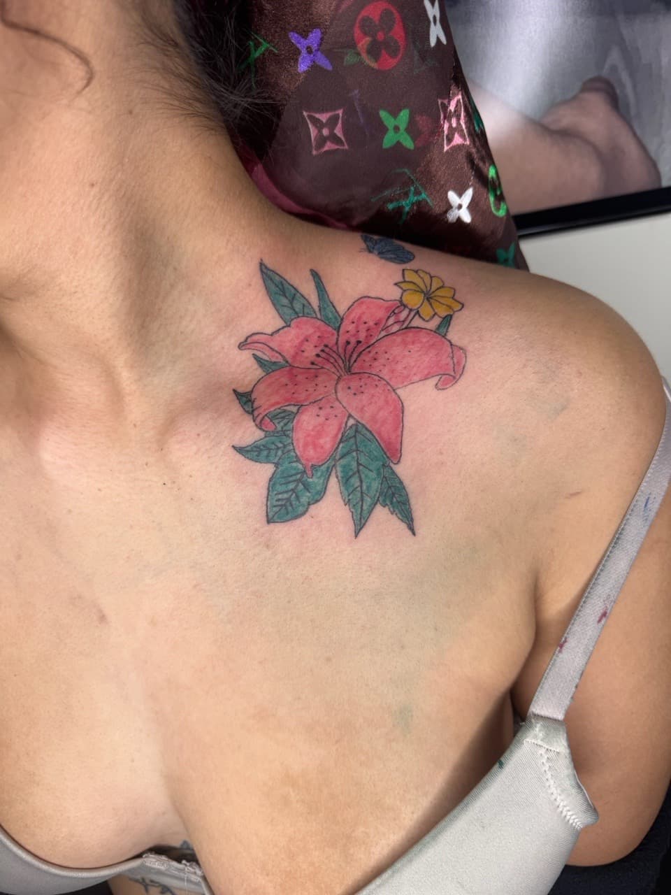Color + Floral flower tattoo on Chest by InkByArtie on TattMe