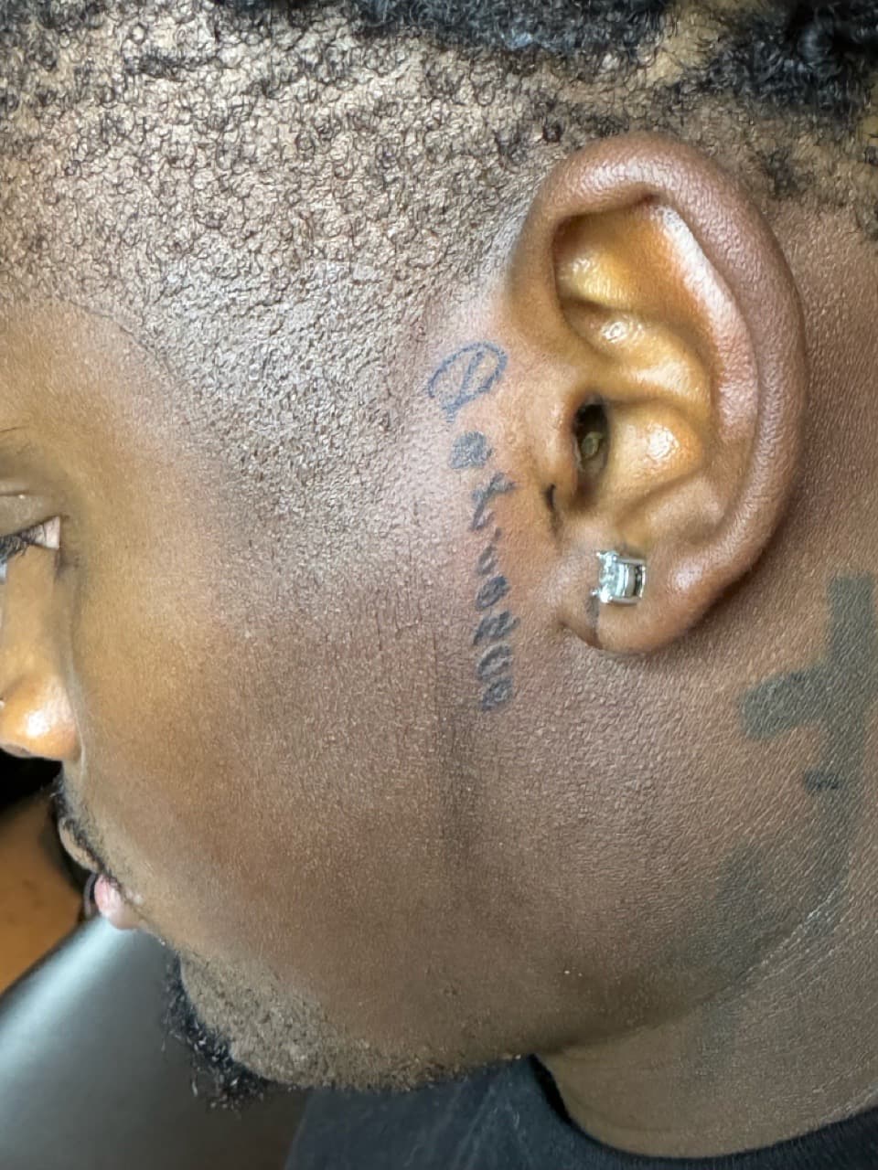 Lettering + Script word tattoo on Face by InkByArtie on TattMe