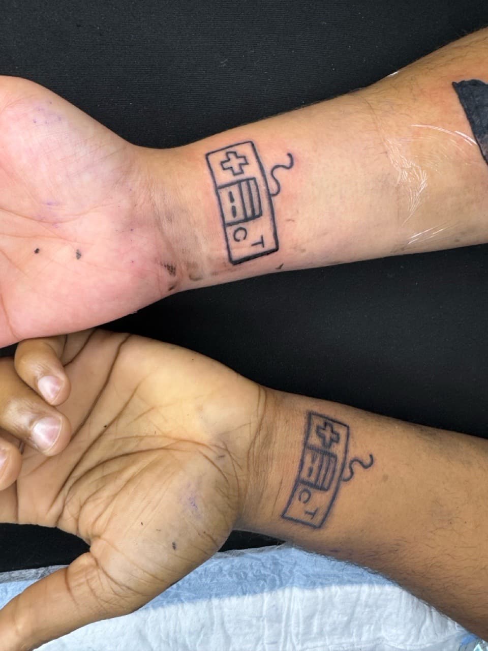Line-work + Minimalist video game controller tattoo on Wrist by InkByArtie on TattMe