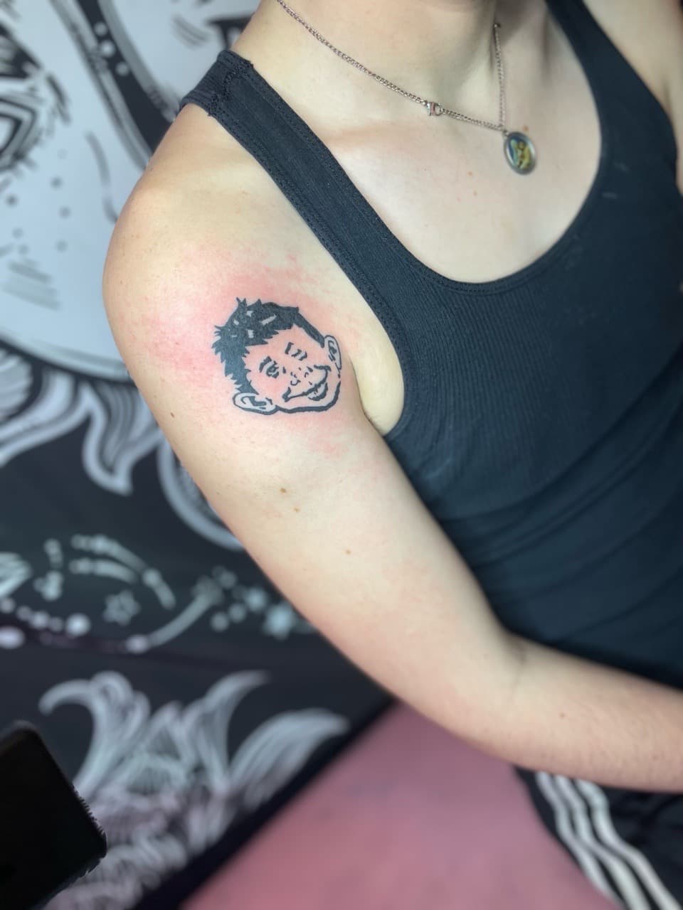 Black-work + Cartoon face tattoo on Upper Arm by Inkbyzaza on TattMe