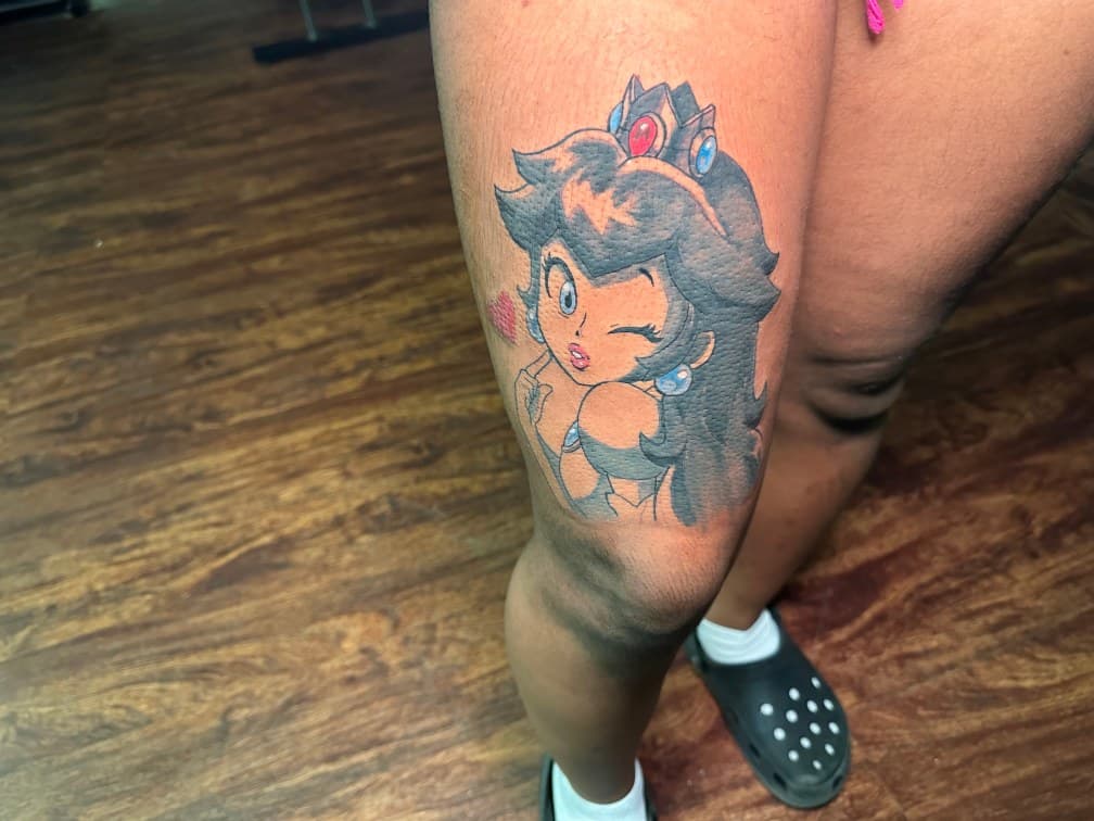 Pop Culture + Cartoon princess peach tattoo on Knee by inkbyt0ny on TattMe