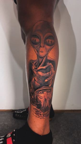 Black & Grey + Illustrative alien tattoo on Calf by inkbyt0ny on TattMe