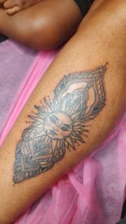 Black & Grey + Illustrative sun tattoo on Calf by Cakes_Ariana on TattMe