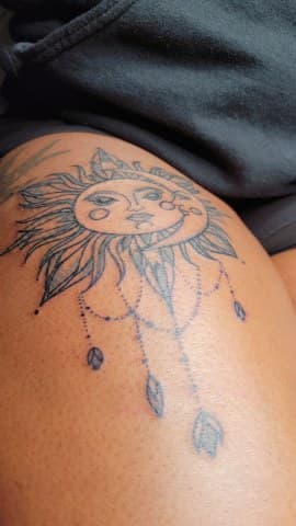 Line-work + Black-work sun tattoo on Thigh by Cakes_Ariana on TattMe