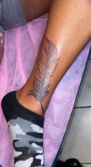 Illustrative + Color feather tattoo on Ankle by Cakes_Ariana on TattMe