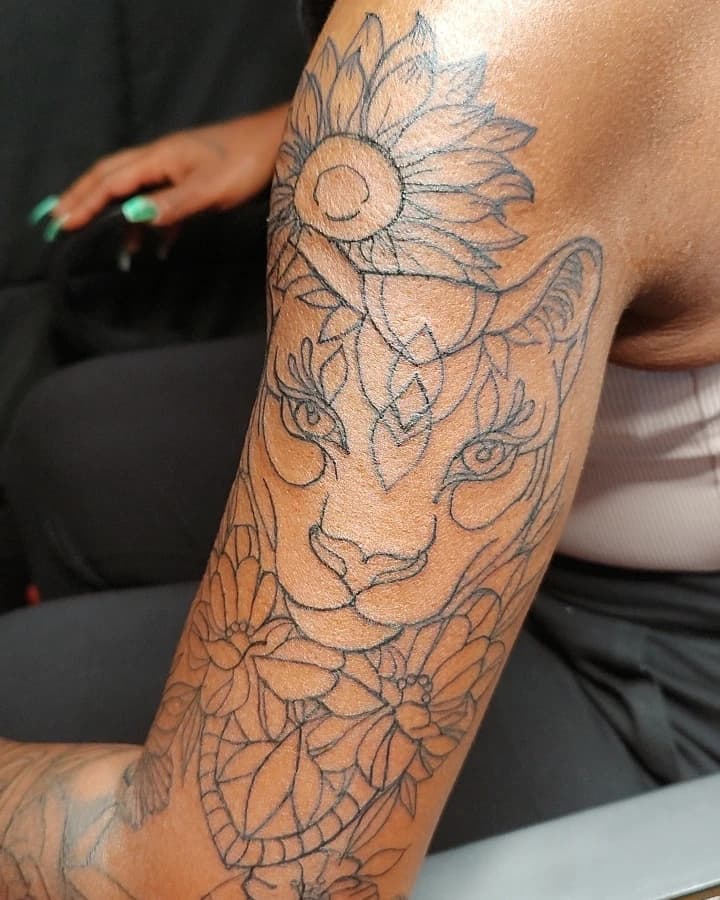 Line-work + Illustrative lioness tattoo on Upper Arm by Cakes_Ariana on TattMe