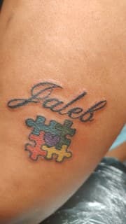 Lettering + Script name tattoo on Upper Arm by Cakes_Ariana on TattMe