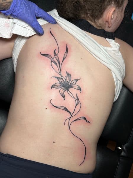 Fine Line + Black & Grey flower tattoo on Side (Torso) by TattedbyJayden on TattMe