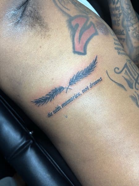 Fine Line + Black & Grey feathers tattoo on Upper Arm by TattedbyJayden on TattMe