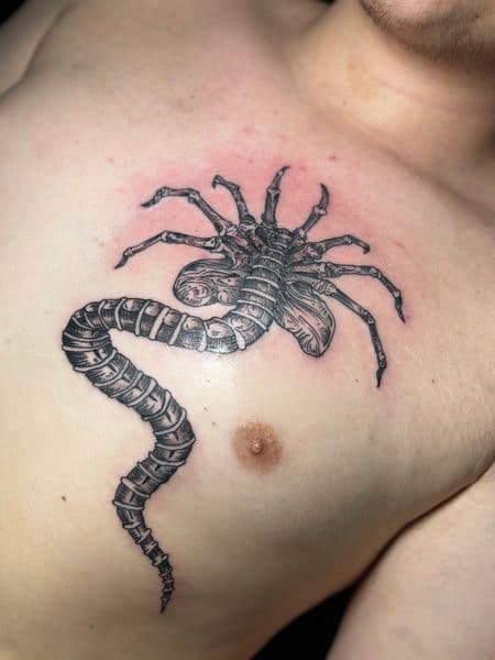 Black & Grey + Illustrative facehugger tattoo on Chest by TattedbyJayden on TattMe