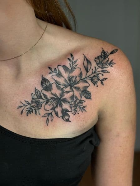 Black & Grey + Floral flowers tattoo on Shoulder by TattedbyJayden on TattMe