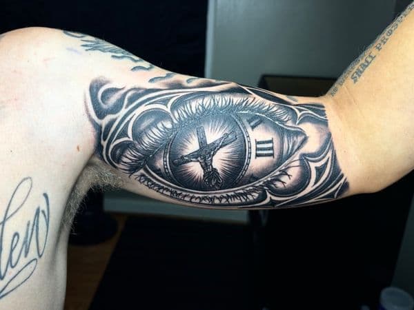 Black & Grey + Realism eye tattoo on Upper Arm by TattedbyJayden on TattMe