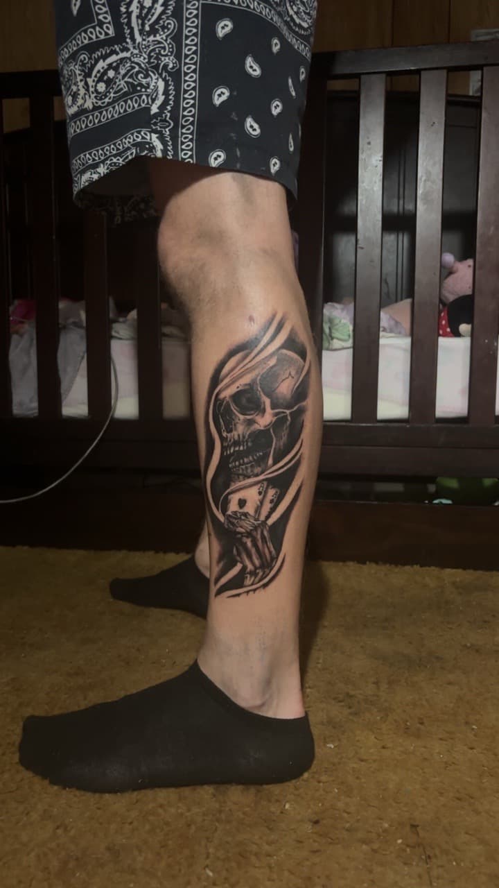 Black & Grey + Realism skull tattoo on Calf by TattedbyJayden on TattMe