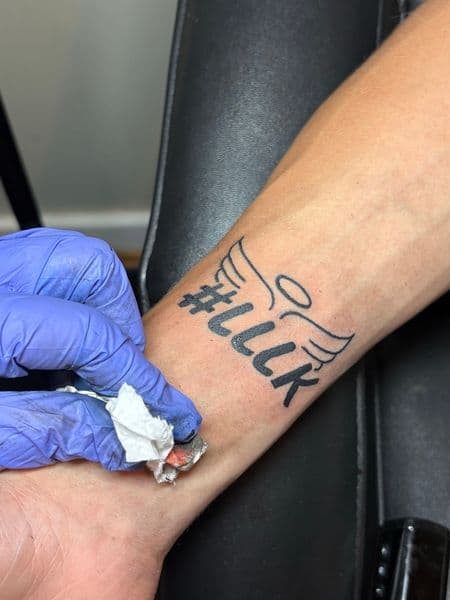 Lettering + Fine Line wings tattoo on Forearm by TattedbyJayden on TattMe