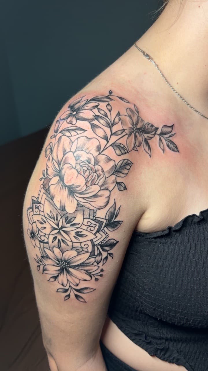 Floral + Black & Grey flowers tattoo on Shoulder by TattedbyJayden on TattMe